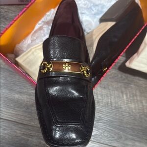 Tory Burch Black and Gold Loafers with Chain Detail